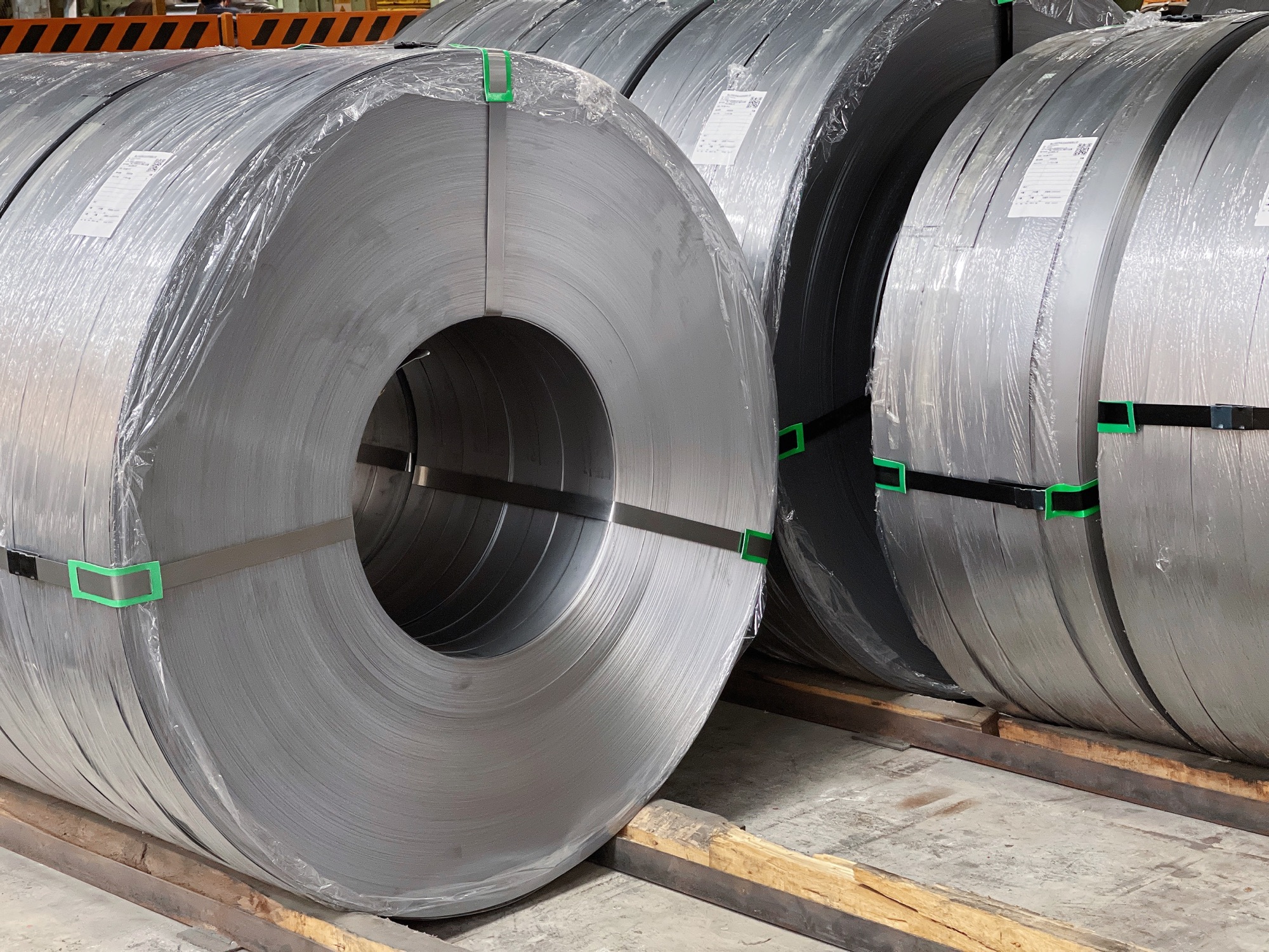Packaged precision slit steel coils