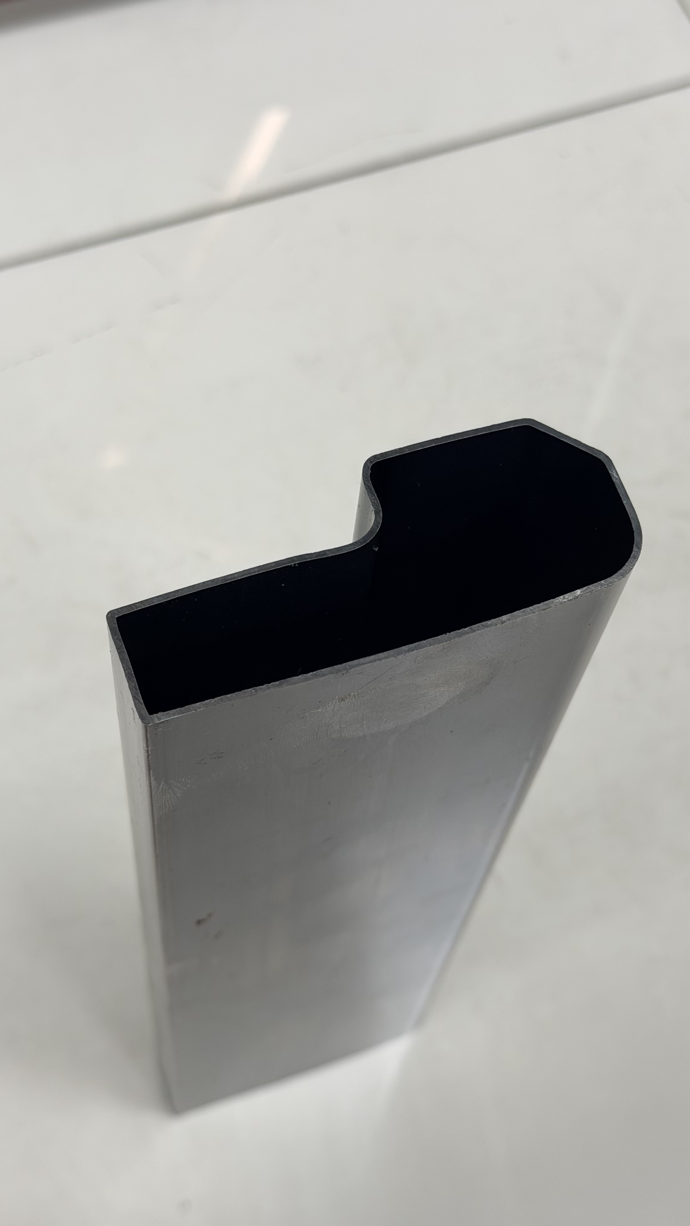 Custom formed steel tube profile with offset geometry