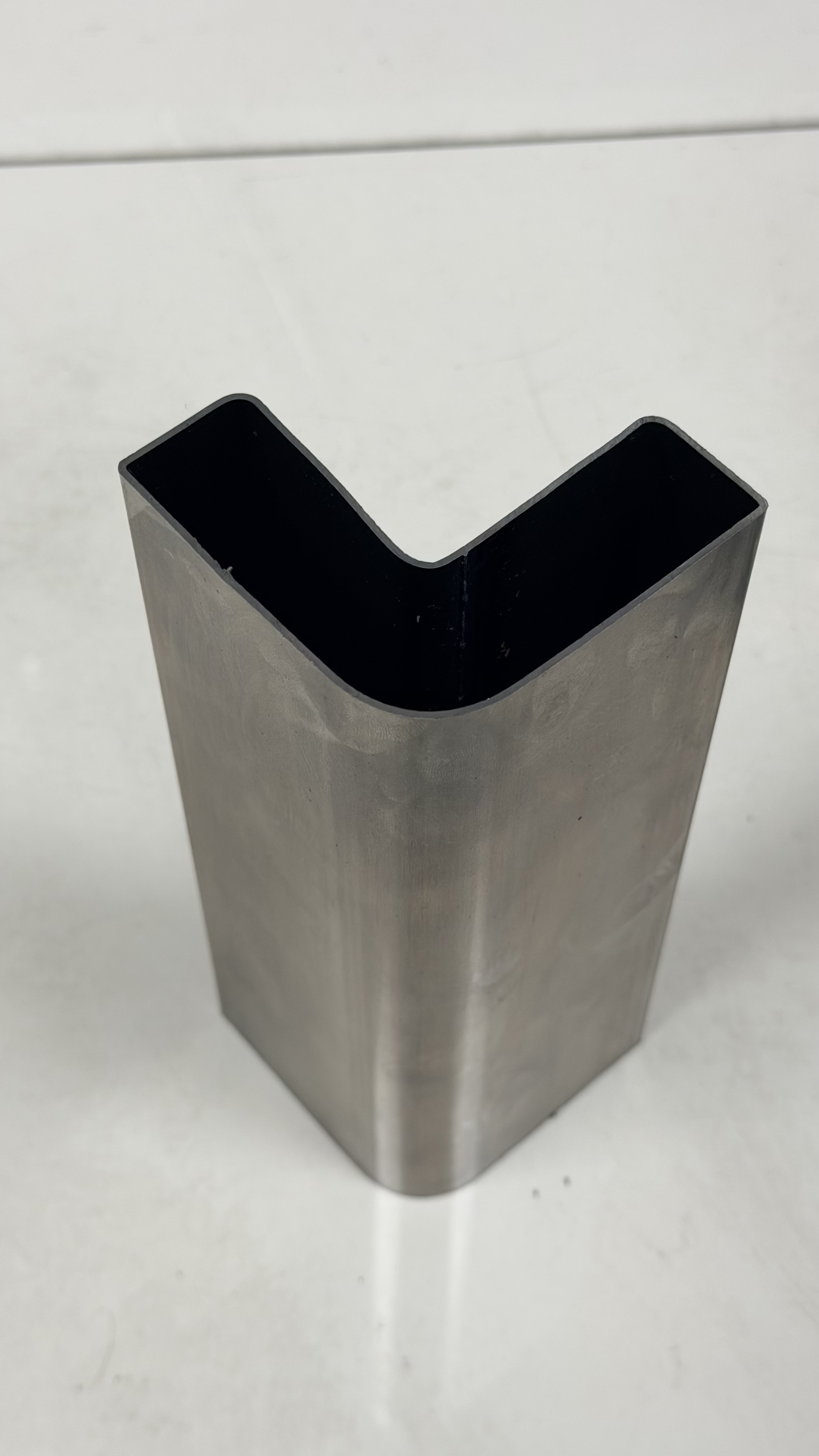 Custom V-shaped steel tube profile